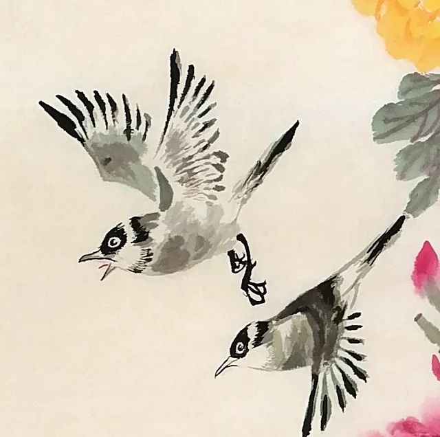 Two small birds fly in among the flowers, one looking back at the other.