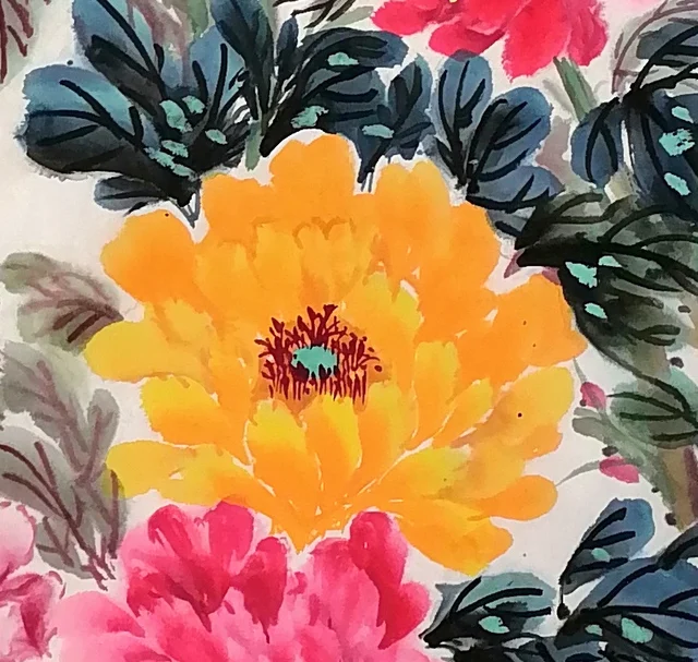 A yellow peony, deepest at the base of the petals, its stamens dotted in gold.
