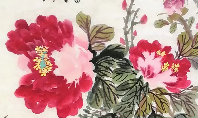 Two red peonies.