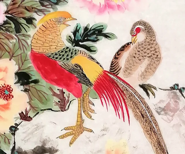 The pheasant pair on the rock; the tail feathers drawn line by line.
