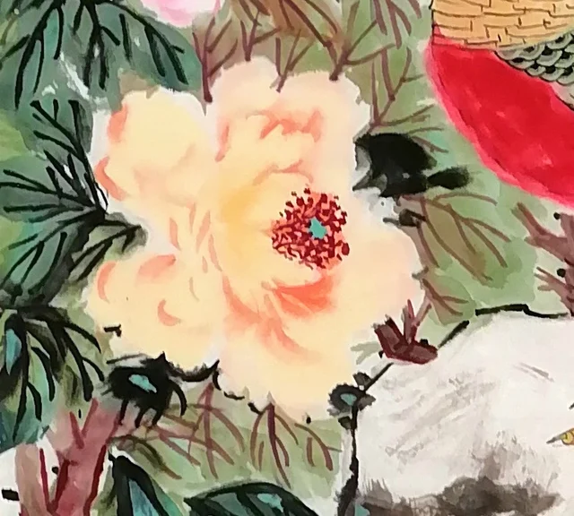 A soft pale yellow peony.