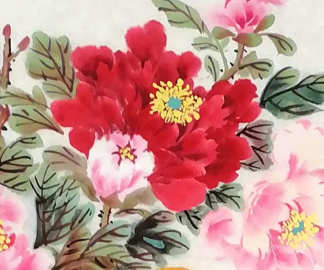 The red peony at the top, with pink blooms.
