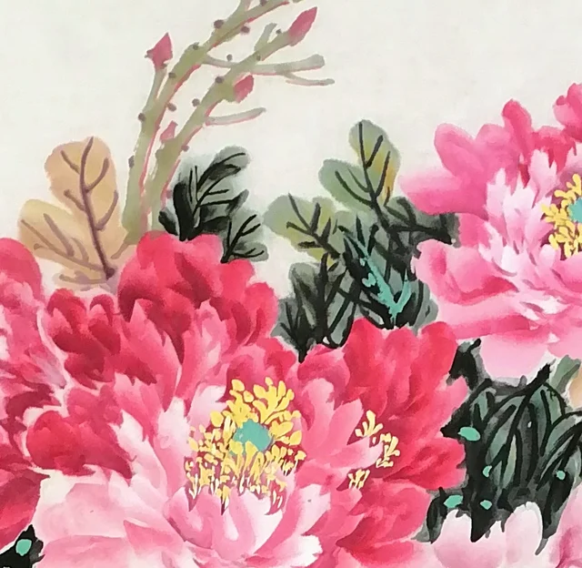 Peonies shading from deep crimson to near-white.