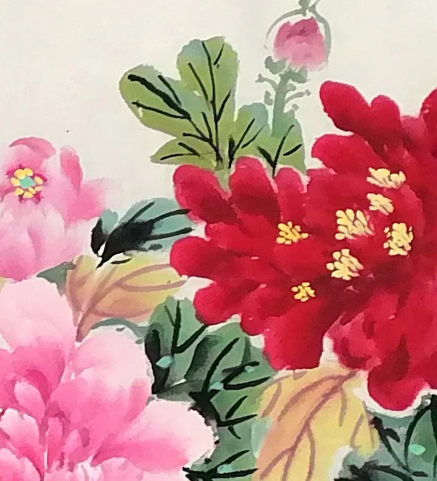 The deep red peony that anchors the upper right.
