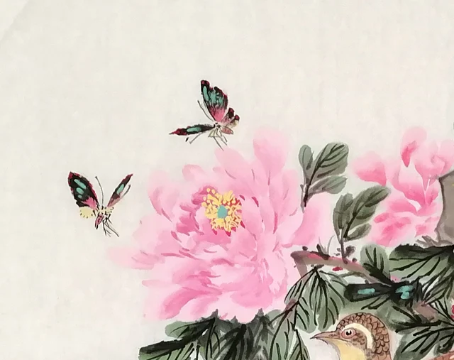 Two butterflies fluttering in at the upper left.