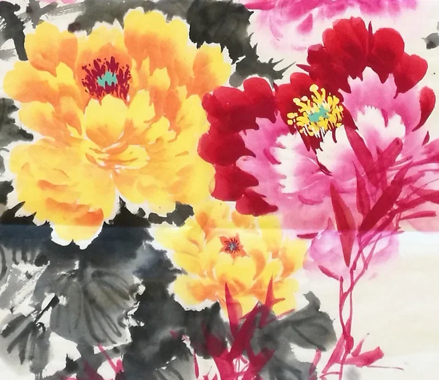 Golden and crimson peonies side by side.