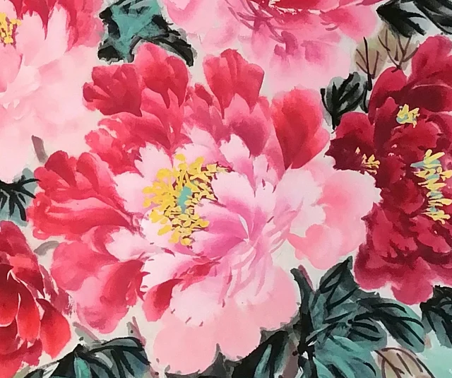 Deep red and pink peonies, dark at the base and pale at the edges.