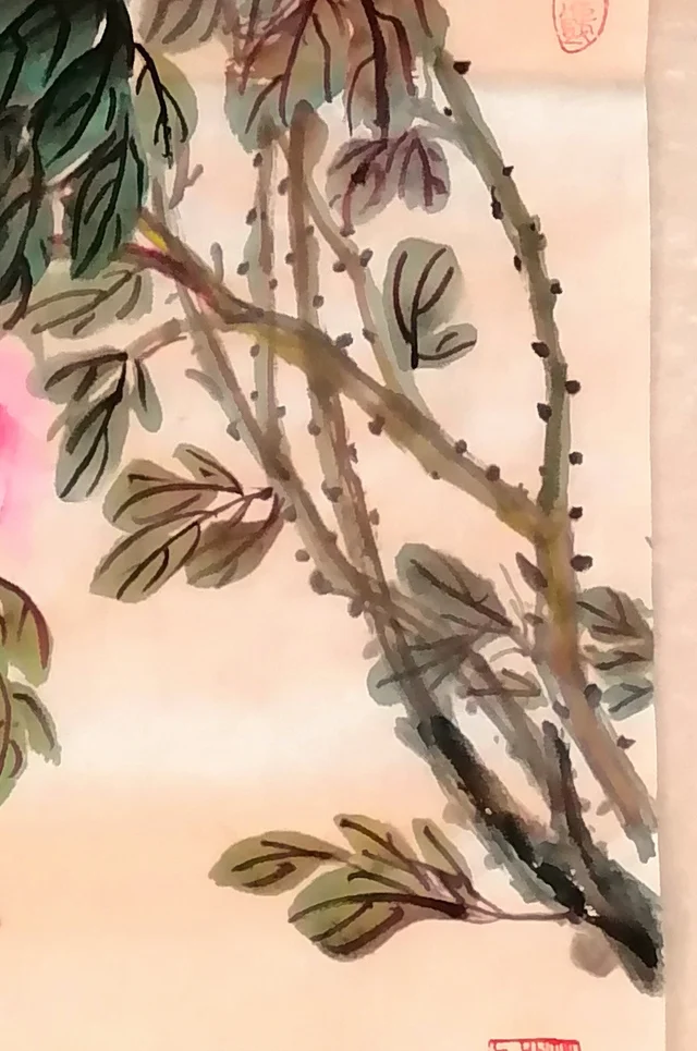 The twisting old stems in ochre and ink.
