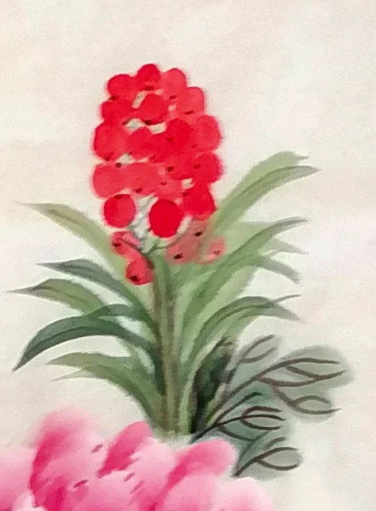 The sacred lily, heavy with red berries.