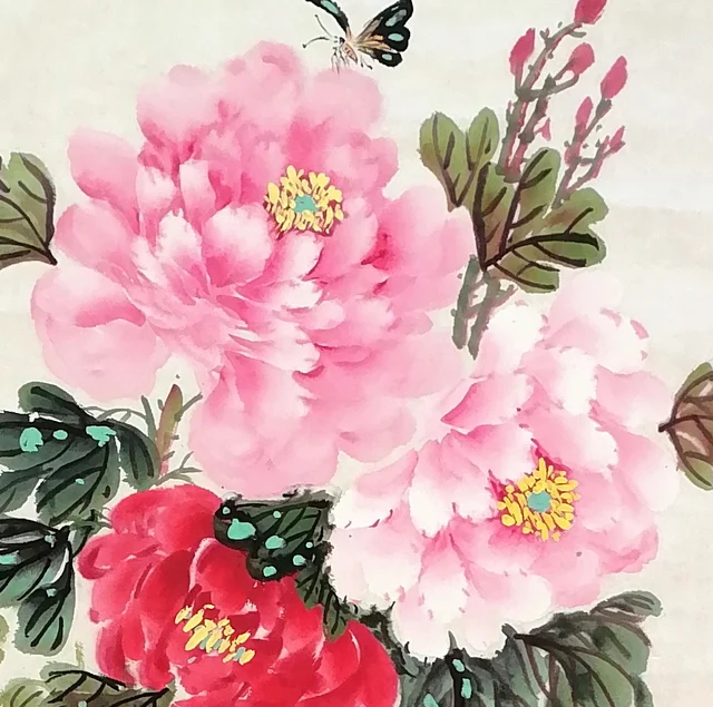 Large pink peonies, layered one over another.