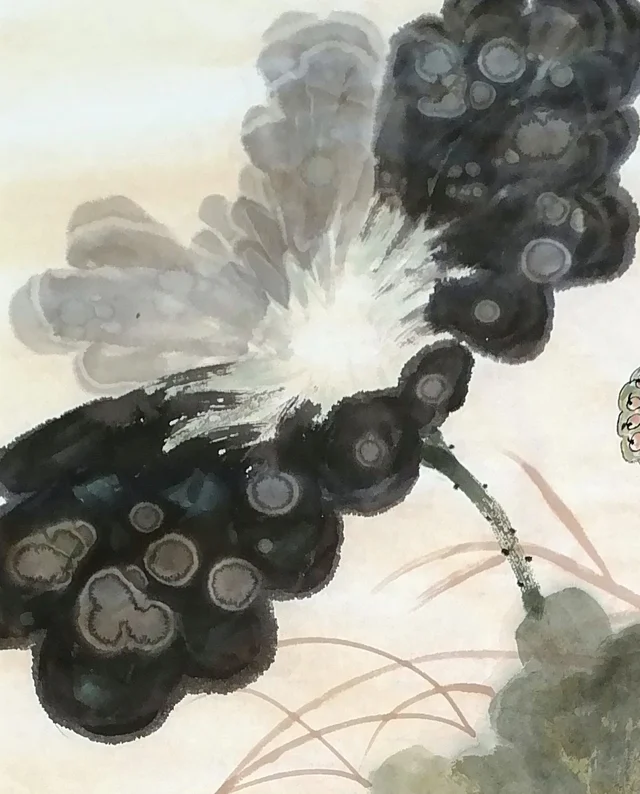 Splashed-ink lotus leaves, dark and pale.