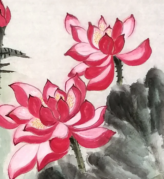 Two red lotuses, outlined and filled.