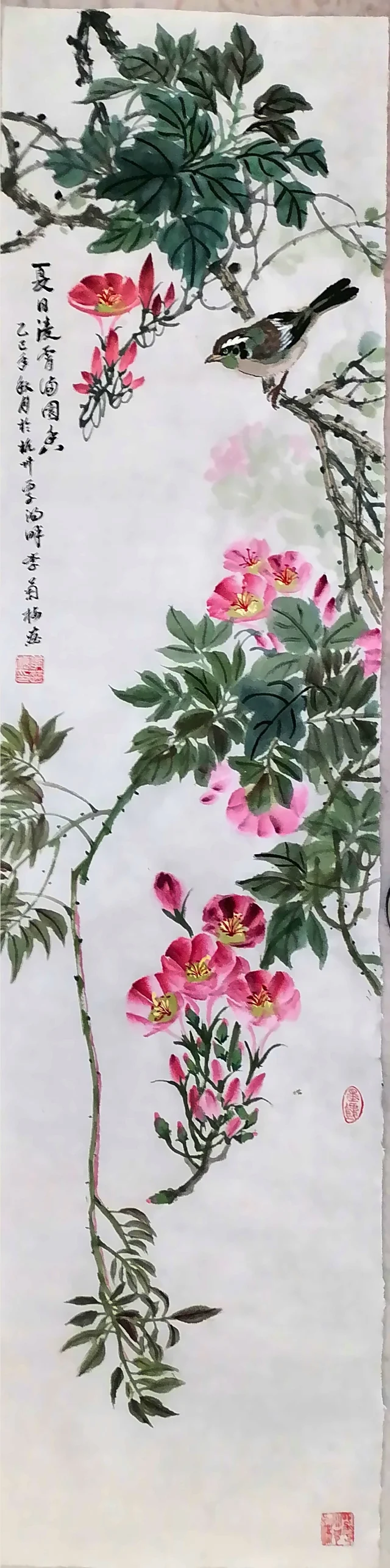 Summer: trumpet creeper and a small bird.