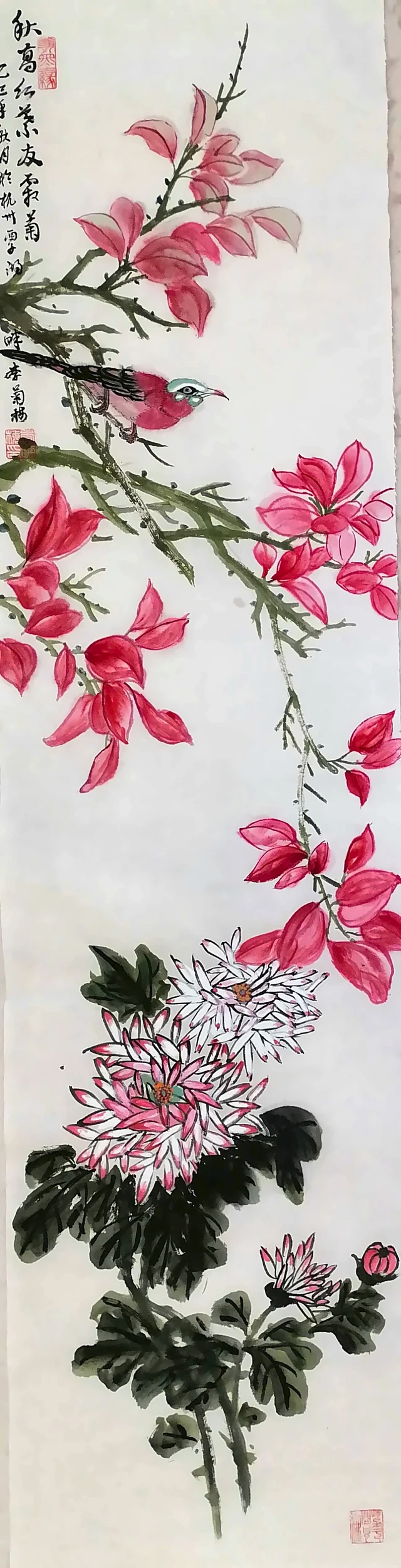 Autumn: red leaves and chrysanthemums.