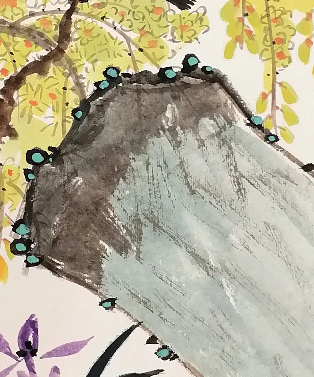 The rock, rubbed in ink, with green moss dots.