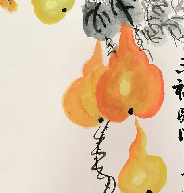Three orange-red gourds, round and glossy.