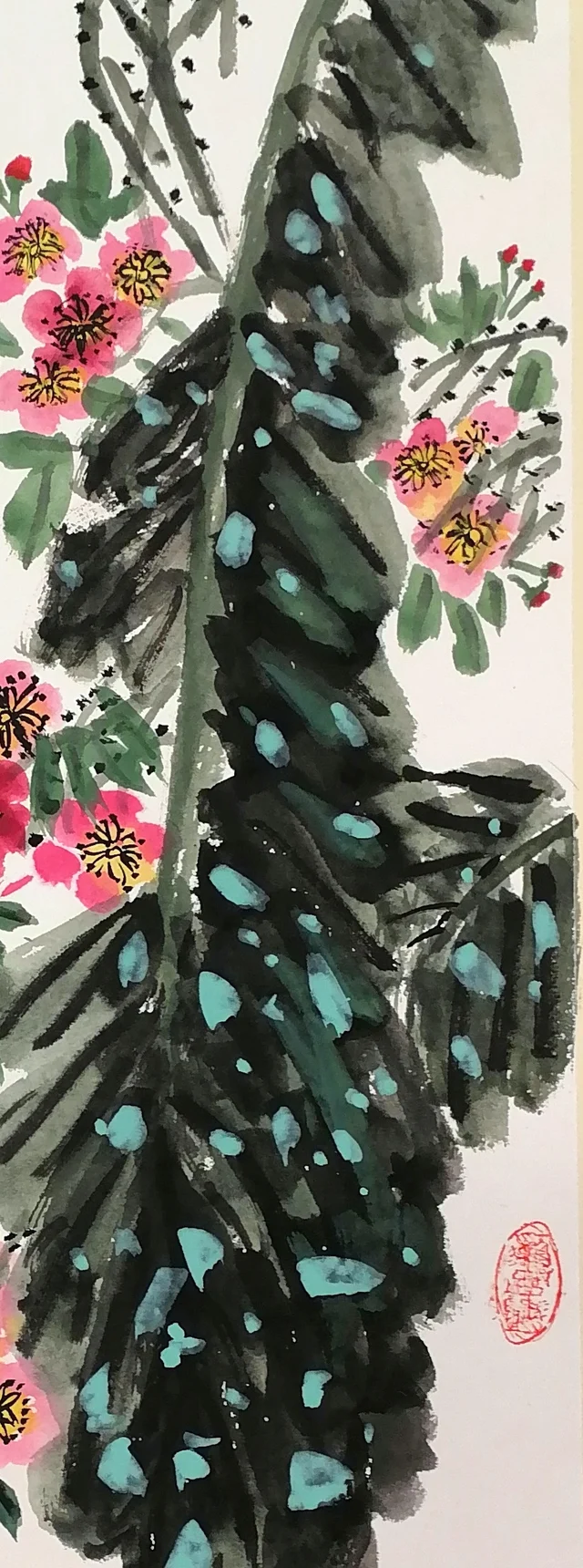 The banana leaf in heavy ink, dotted with green.