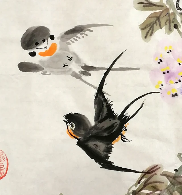 Two birds flying in; the swallow swerves down.