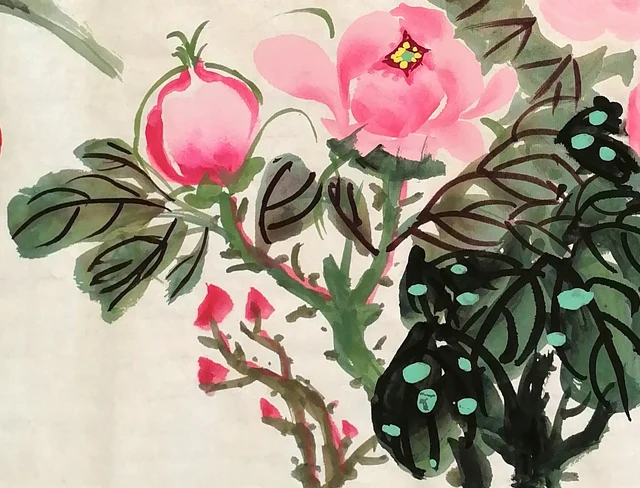 A small peach-coloured flower and a bud.