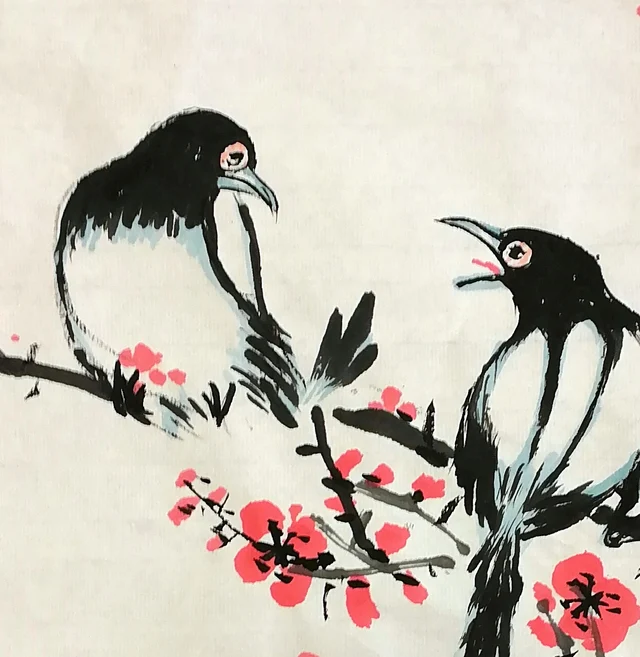 The pair of magpies, one resting, one calling.