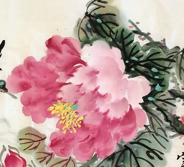 The pink peony, shaded in layers.