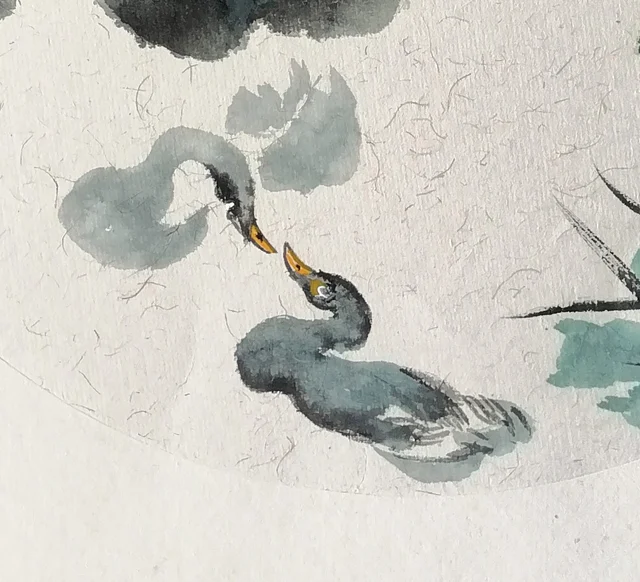Two pale ink waterbirds, half there.