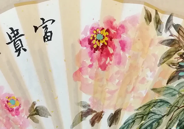 Two peonies washed in soft colour.