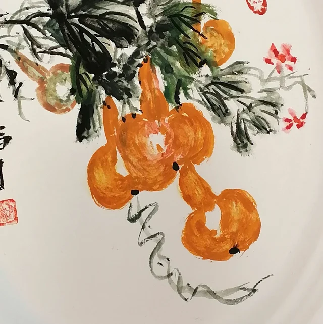 Round orange gourds.