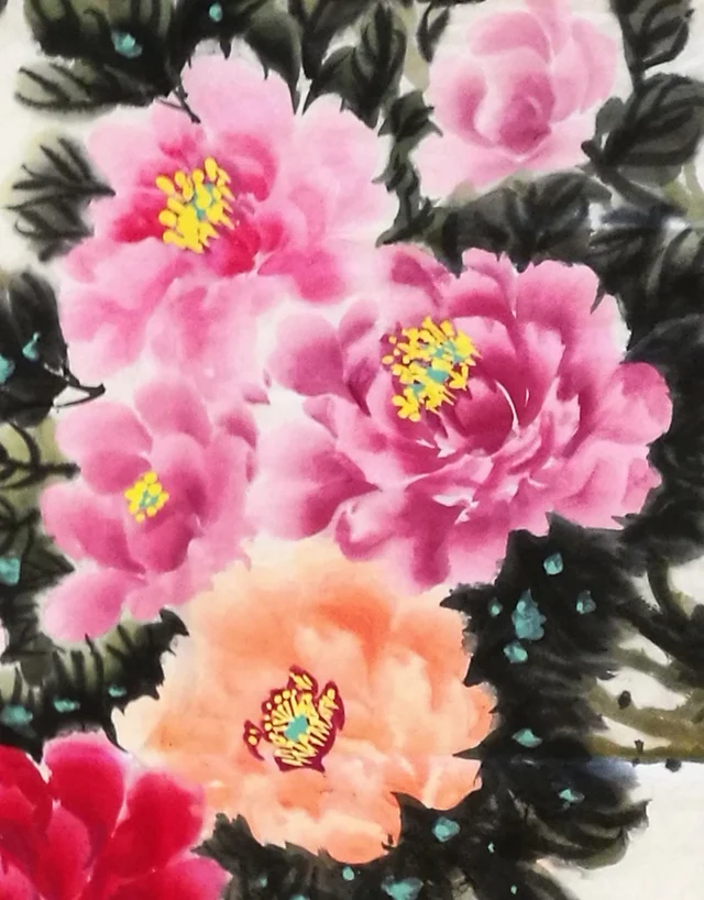 An apricot peony among the pinks.