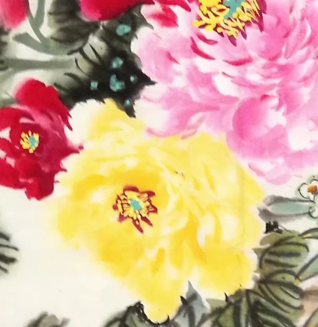 A large yellow peony in the lower half.