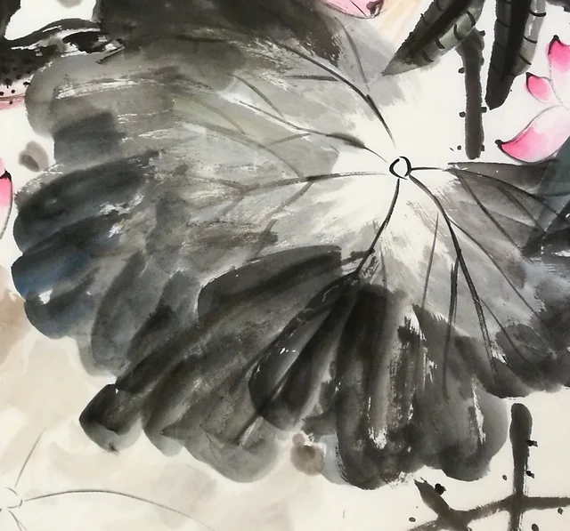 A splashed-ink leaf, dark and pale breaking into each other.