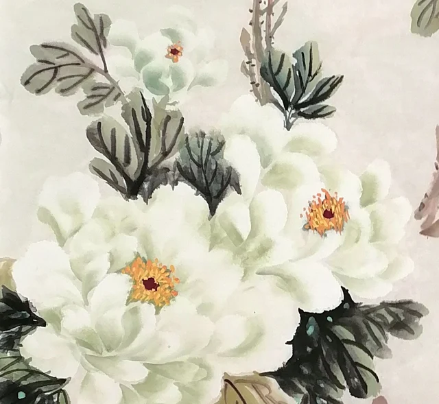 White peonies on the left with golden hearts.