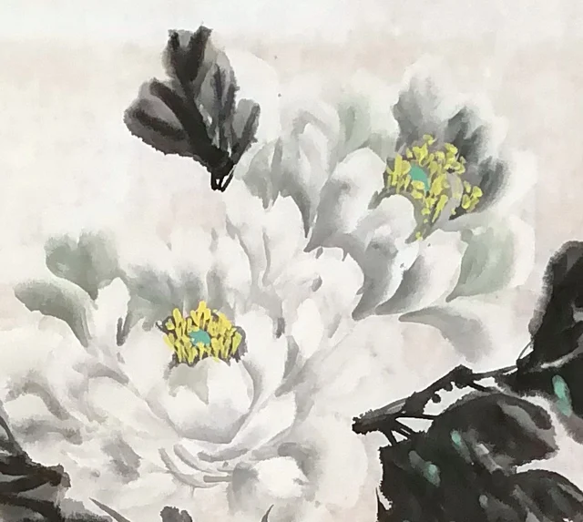 The upper white peonies, their petal edges left white.