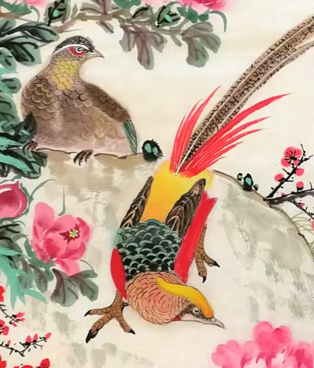 The pheasant pair; the male leans head-down, tail raised.