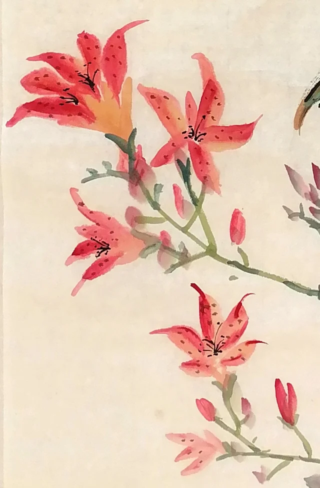 Daylilies at the lower left, freckled with ink.