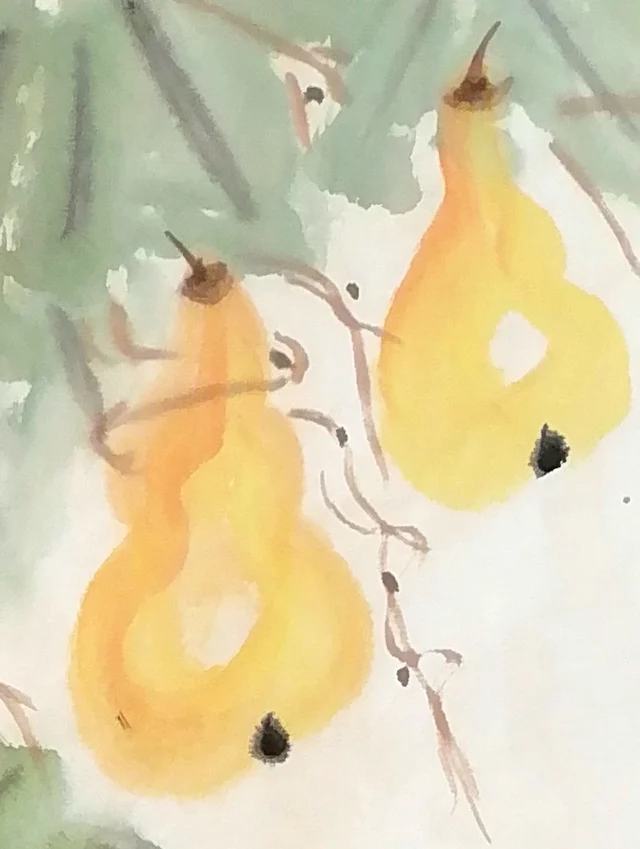 Two gourds above, among curling tendrils.