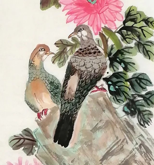 The pair of doves on the rock.