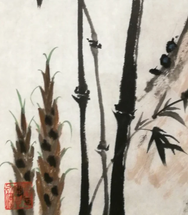 Two bamboo shoots at the foot of the stems.