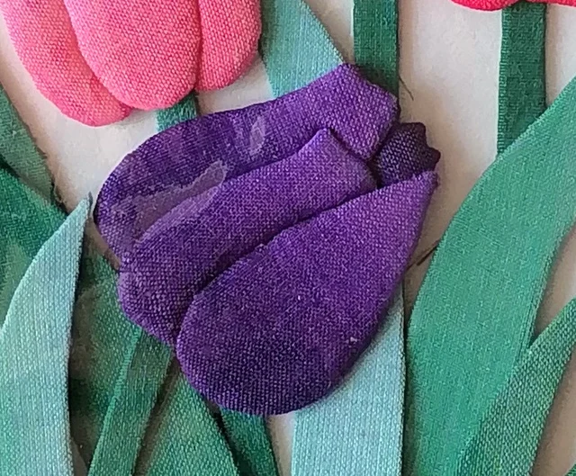 The purple tulip, its cloth dyed from deep to pale.